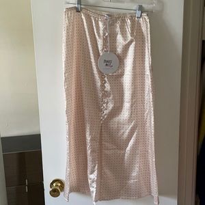 Princess Polly satin skirt. Black polka dots. Size 4.